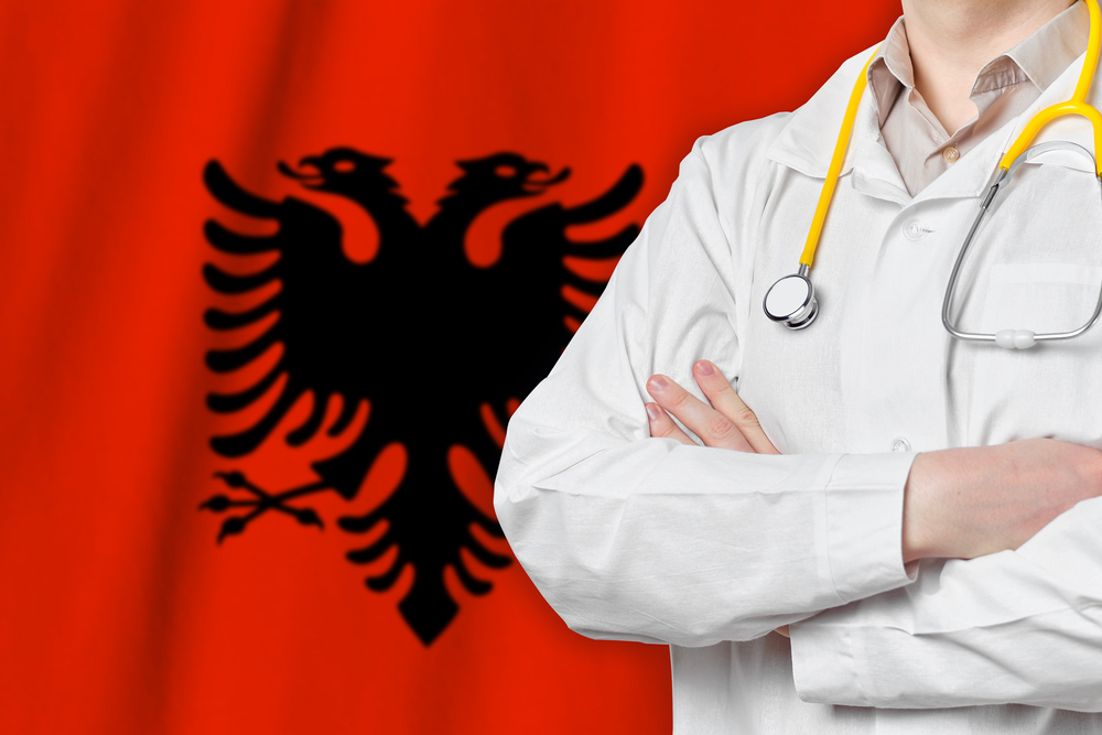 Republic,Of,Albania,Healthcare,Concept,With,Doctor,On,Flag,Background.
