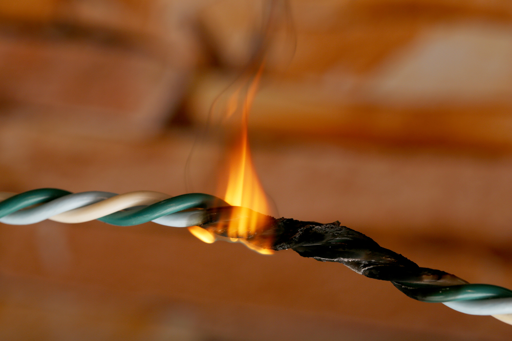 Short,Circuit,,Burnt,Cable,,On,Dark,Color,Background