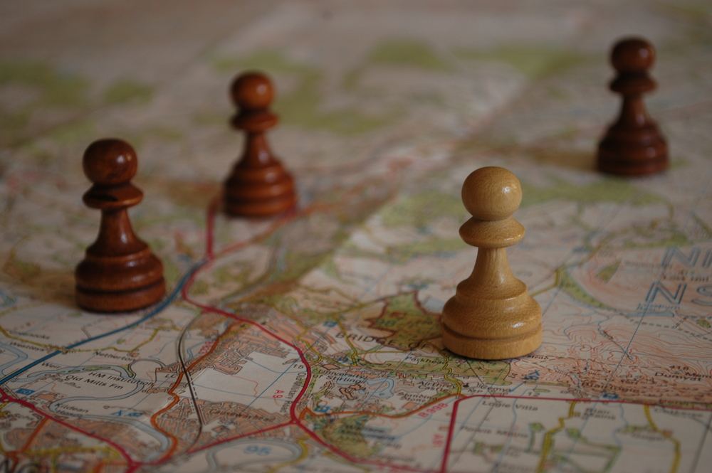 Chess,Pieces,On,Map,Depicting,Strategic,Planning