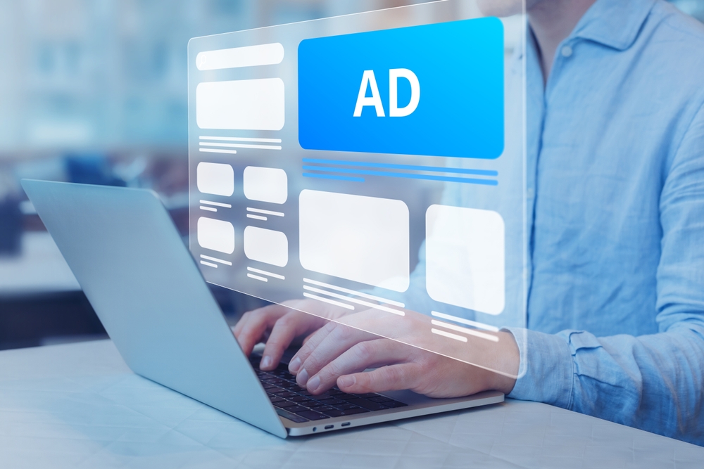 Programmatic,In-feed,Advertisement,On,Computer,Screen.,Person,Viewing,Website,With