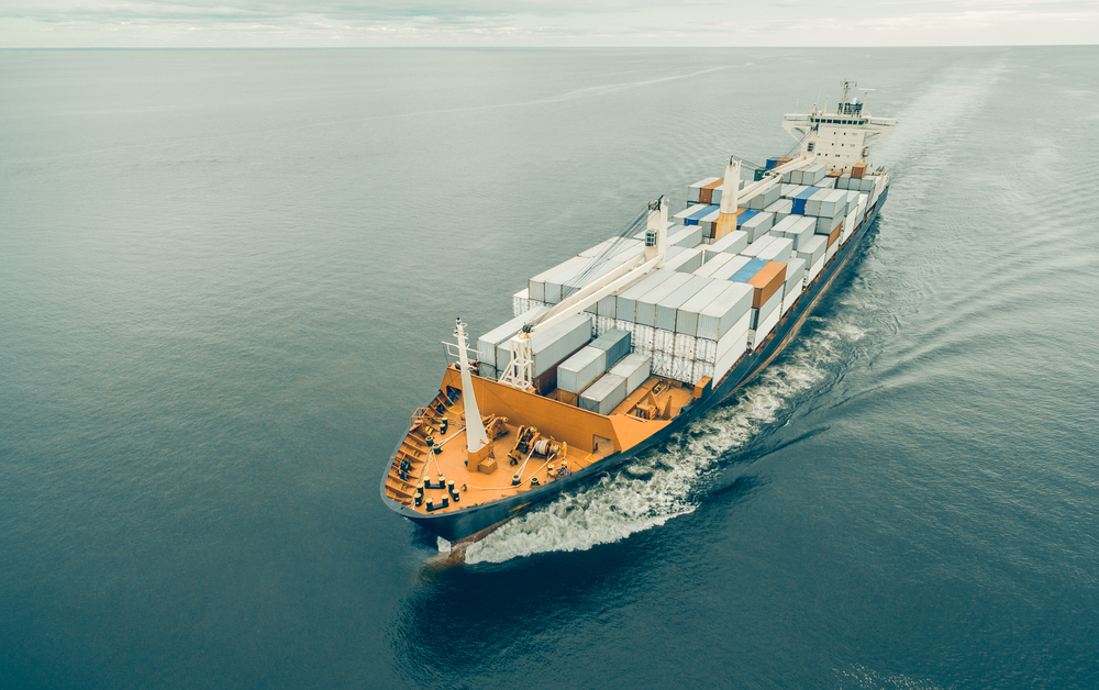 Aerial,View,Of,Cargo,Ship,Sailing,In,Open,Sea