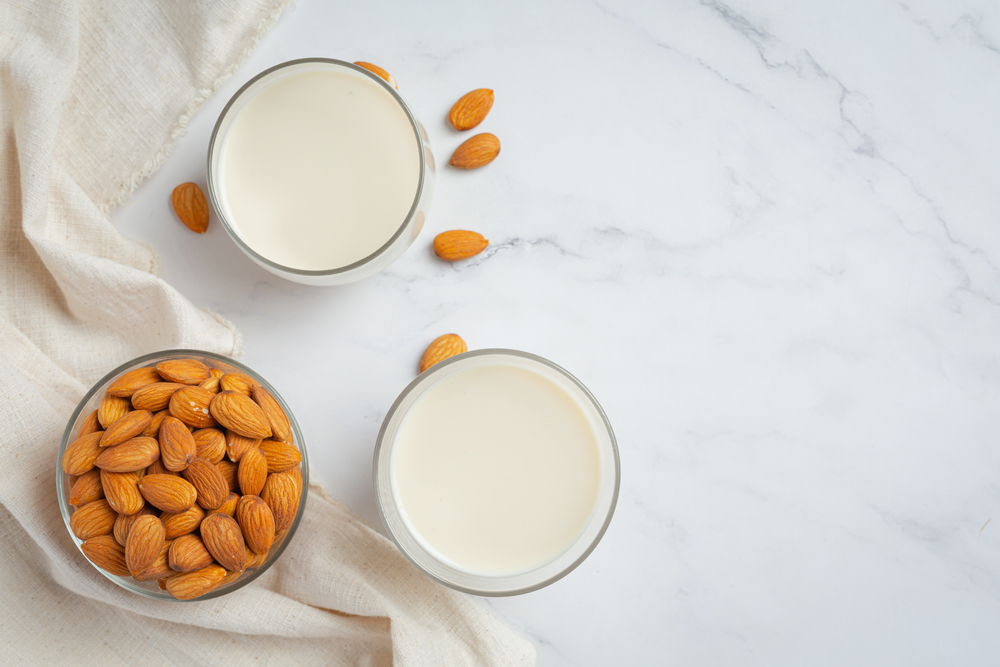 Almond,Milk,With,Almond,On,Marble,Background