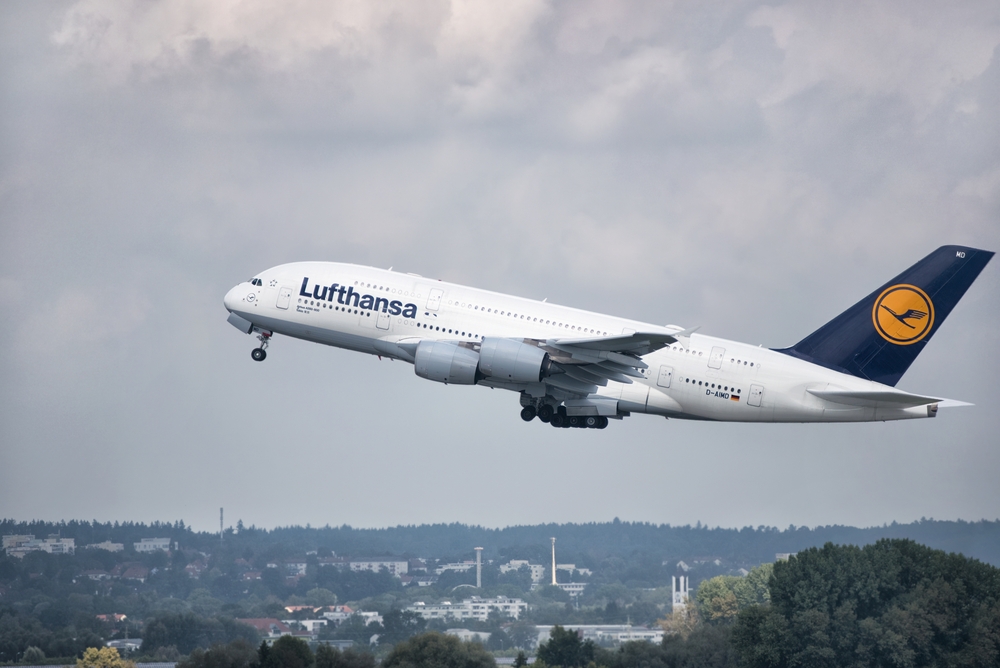 A,Big,Lufthansa,Jet,Taking,Off,In,Blue,Cloudy,Sky: