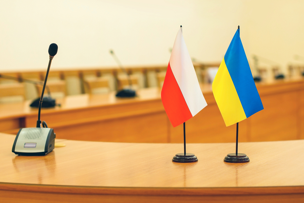 Flags,Of,Poland,And,Ukraine,On,The,Negotiating,Table