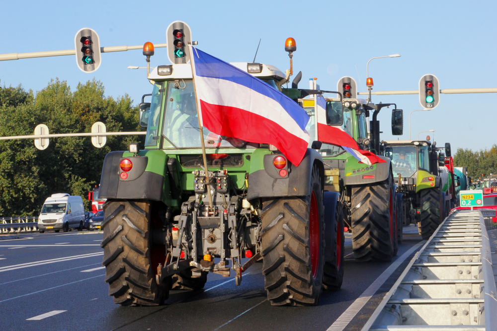 Rows,Of,Farmer,Tractors,With,Dutch,Flag,Upside,Down,On