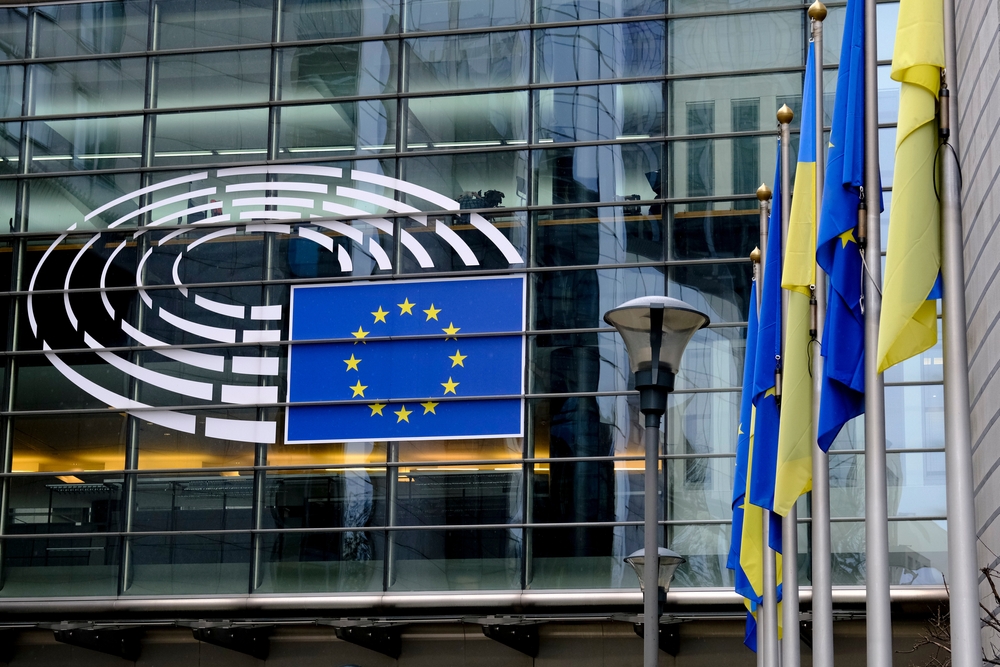Flags,Of,European,Union,And,Ukraine,Flutter,Outside,Eu,Parliament