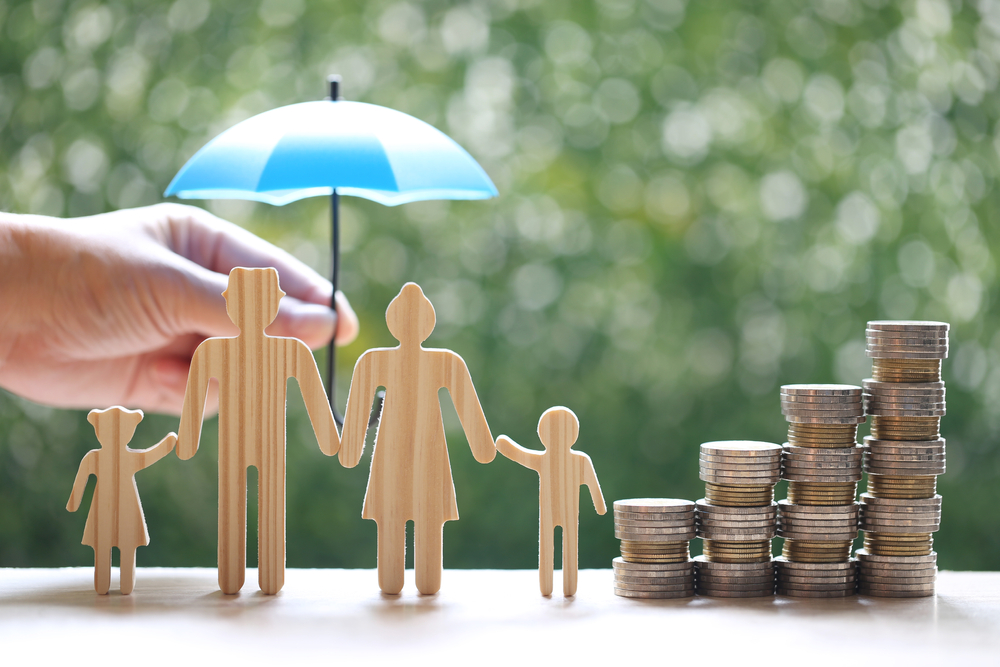 Protection,model,Family,With,Hand,Holding,The,Umbrella,And,Stack,Of
