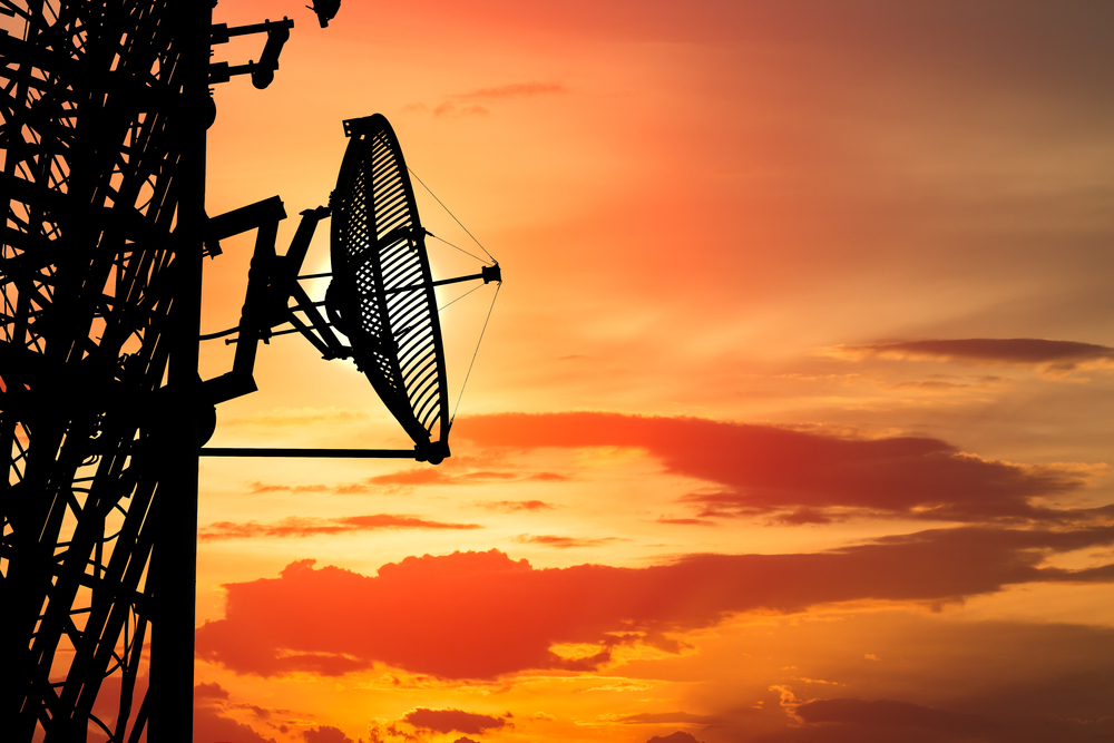 Silhouette,Satellite,Communication,Tower,Poles,On,Sunset