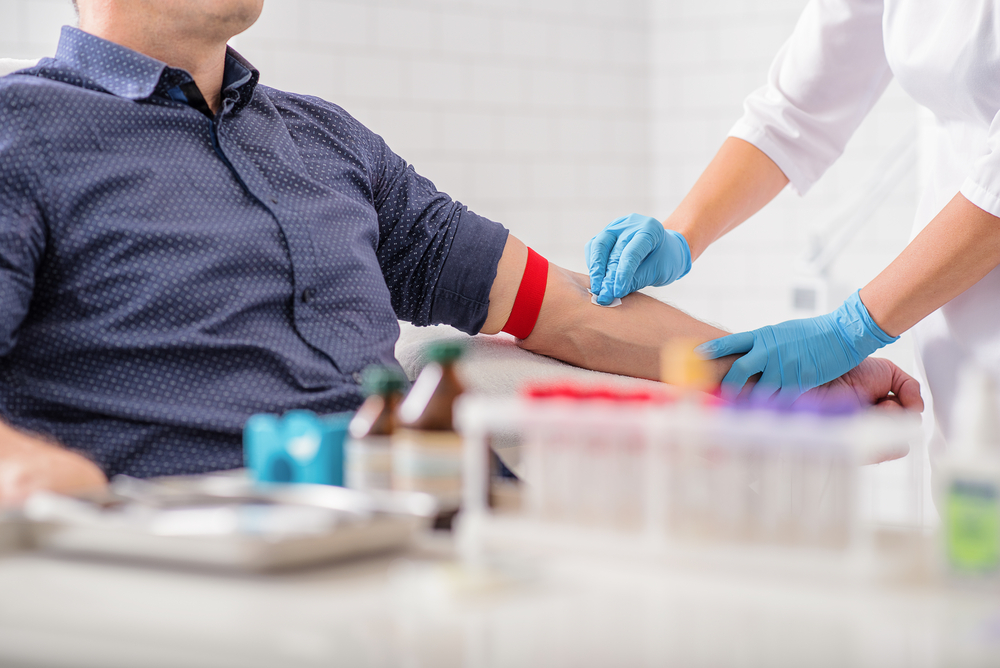 Close,Up,Of,Nurse,Disinfecting,Male,Arm,Before,Blood,Test.