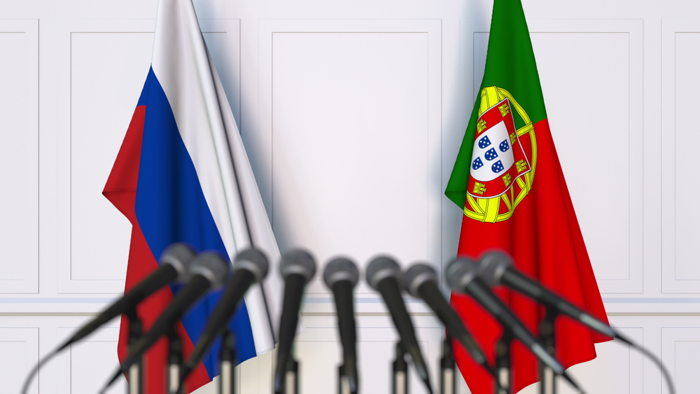 Flags,Of,Russia,And,Portugal,At,International,Meeting,Or,Conference.