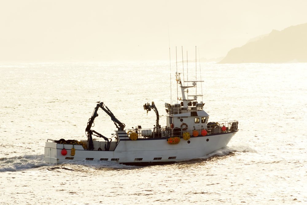 Professional,Fishing,Boat,In,Navigating,At,Sunrise,In,Atlantic,Coast