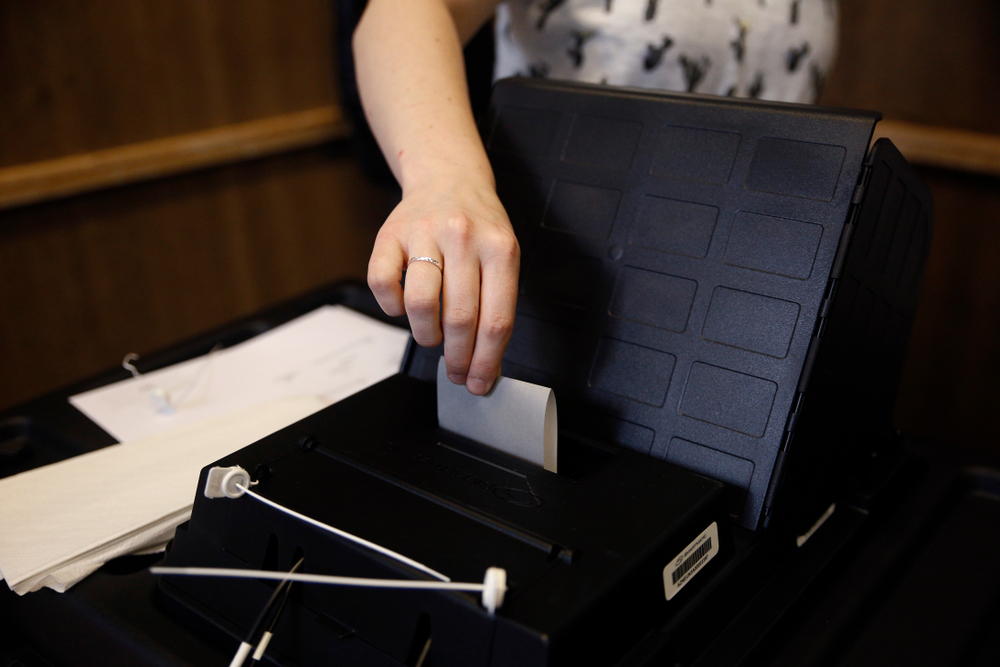 Voters,Cast,Their,Vote,In,The,Municipal,Election,At,A