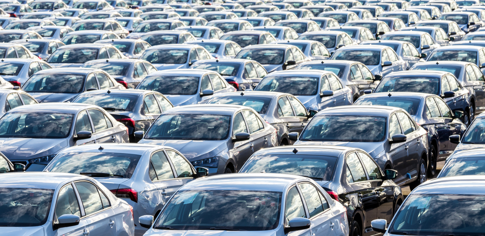 Rows,Of,A,New,Cars,Parked,In,A,Distribution,Center