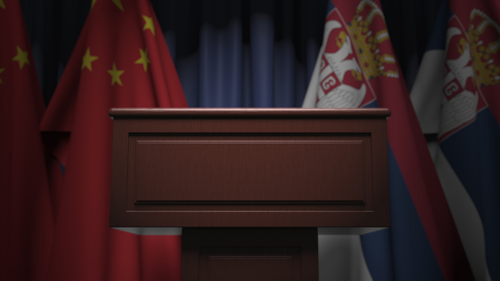 Many,Flags,Of,Serbia,And,China,Behind,Speaker,Tribune,,3d
