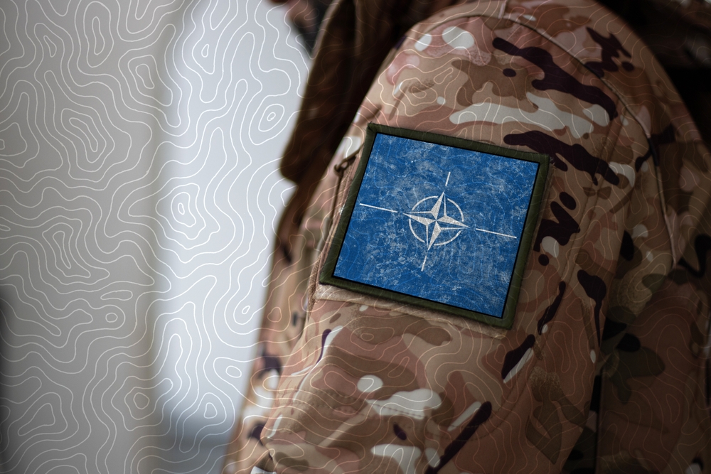 Nato,Soldier.,Soldier,With,Flag,Nato,,Nato,Flag,On,A