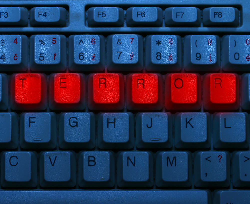 Dirty,Blue,Keyboard,With,Red,Notice,Terror.,Terrorism,Online,Concept.