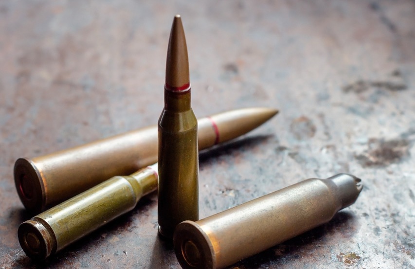 Diverse,Weapon,Bullets,On,Rusty,Metal,Background.,Military,Industry,,War,