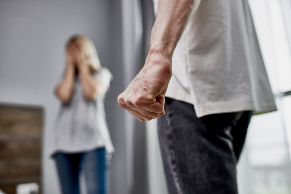Close-up,Photo,Of,Male,Fist,,Angry,Man,And,Scared,Woman