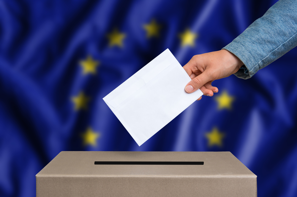 Election,In,European,Union.,The,Hand,Of,Woman,Putting,Her