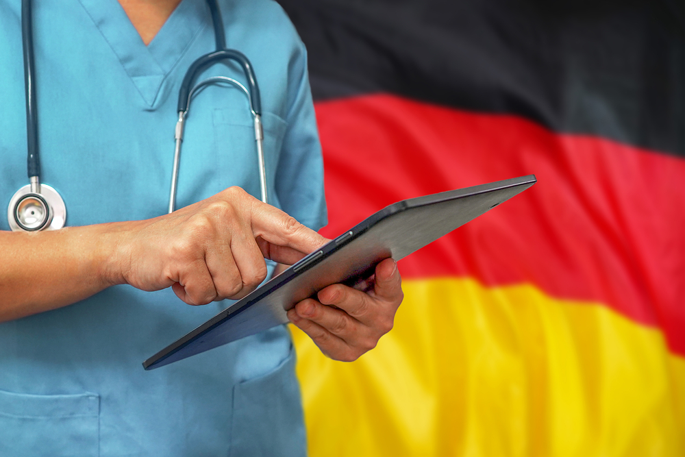 Surgeon,Or,Doctor,Using,A,Digital,Tablet,On,The,Background