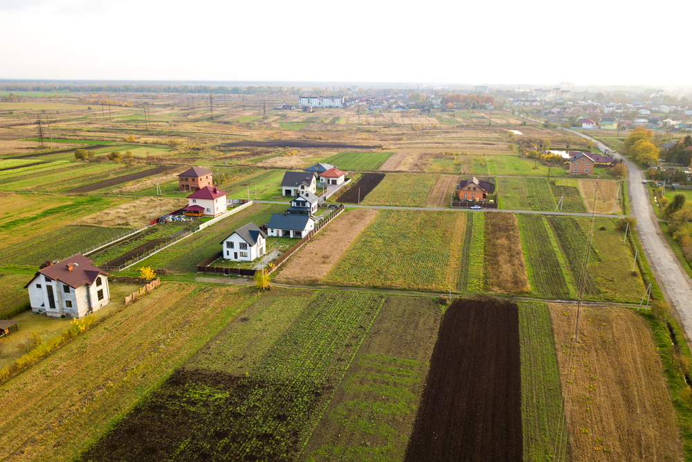 Aerial,View,Of,Home,Roofs,In,Residential,Rural,Neighborhood,Area.