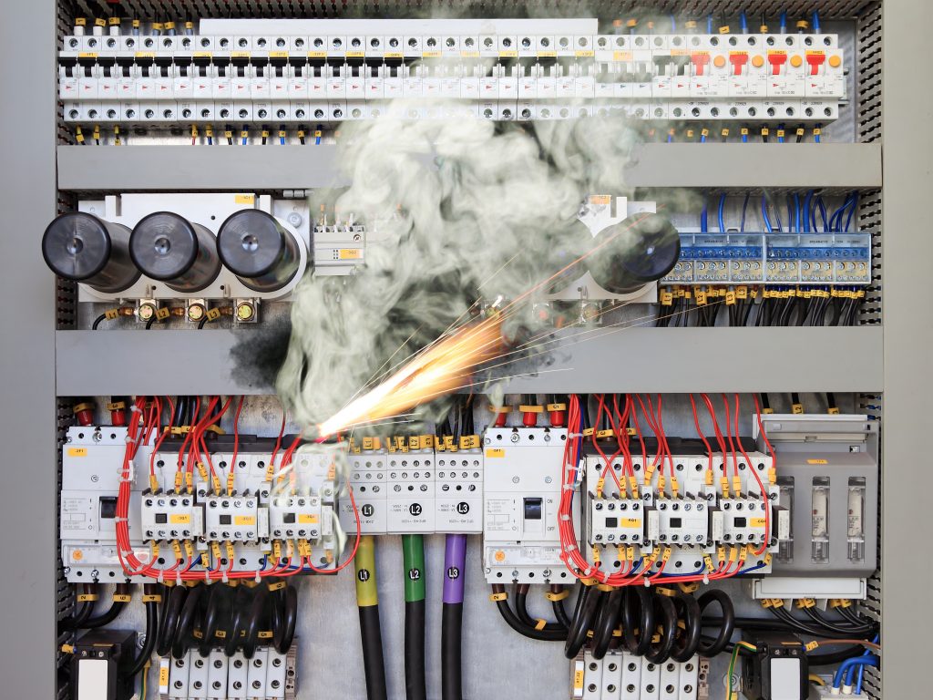 Overloaded,Electrical,Circuit,Causing,Electrical,Short,And,Fire.