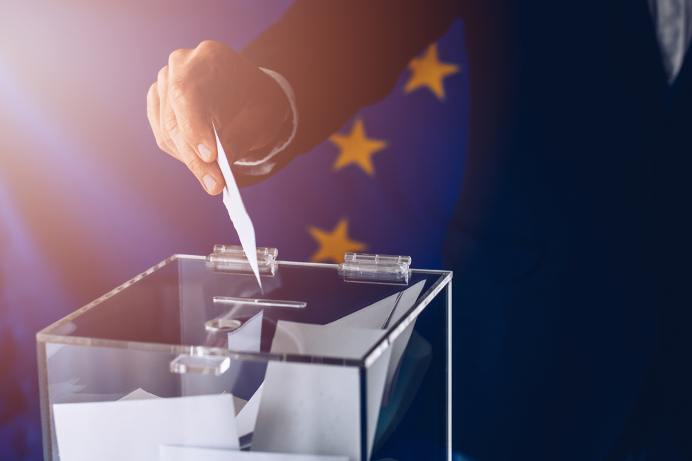 Eu,Elections.,Man,Throwing,His,Vote,Into,The,Ballot,Box.