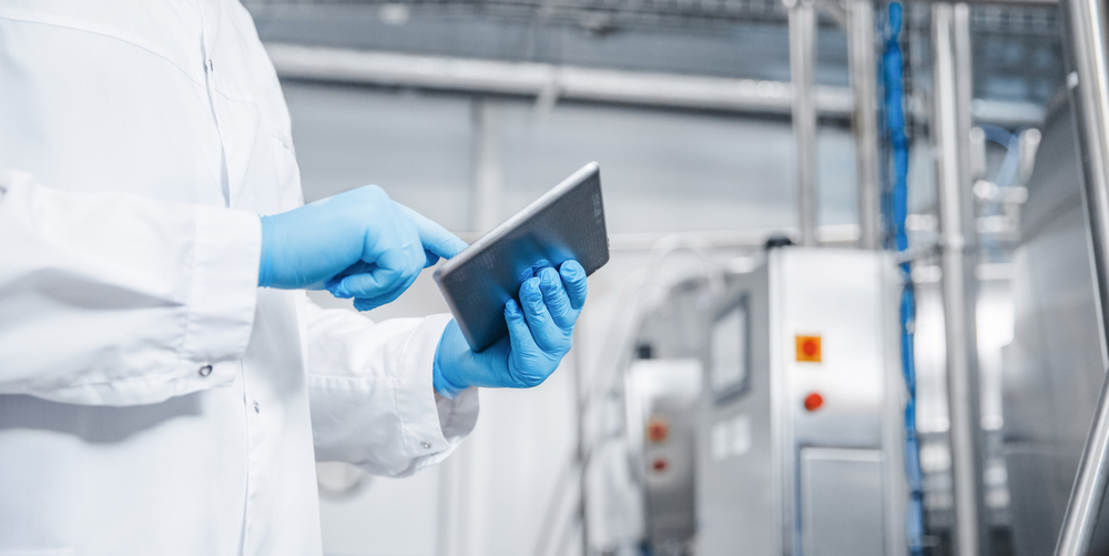 Man,Worker,Holding,Tablet,Computer,Checking,Production,Line,Dairy,Factory