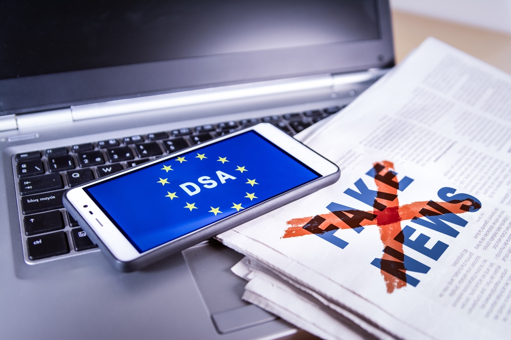 Smartphone,With,Dsa,And,Eu,Flag,On,Screen,Over,A