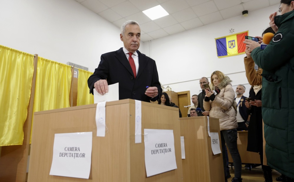 Romanian far-right runoff candidate Calin Georgescu votes in parliamentary elections