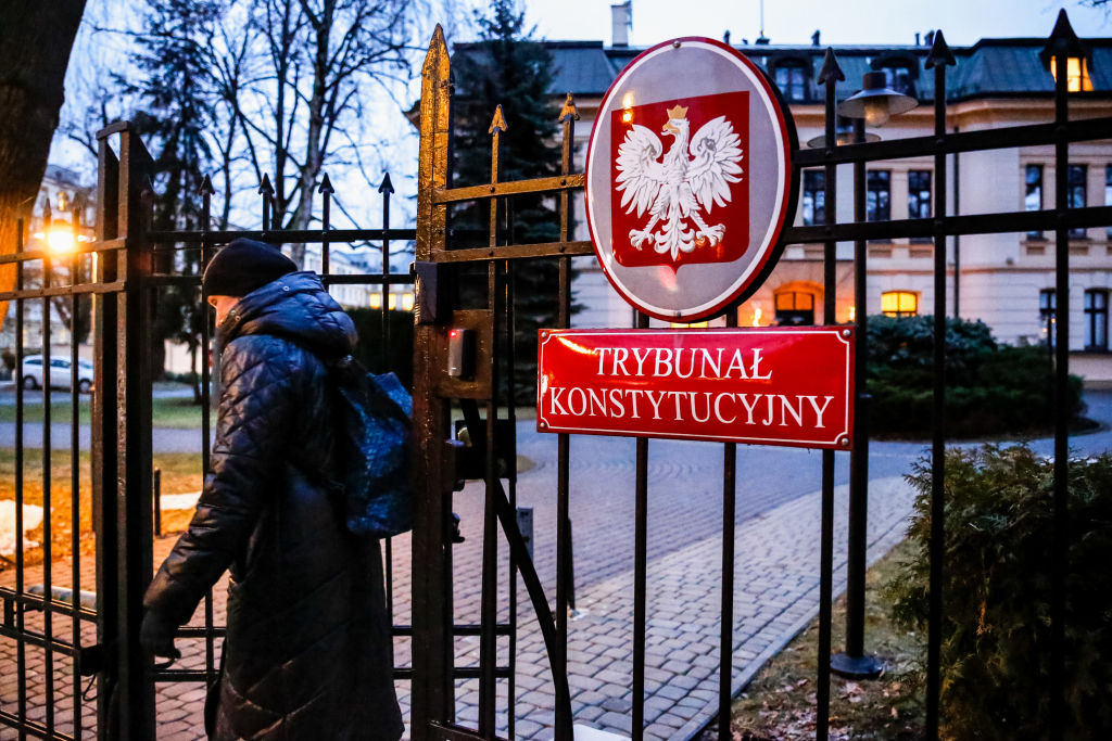 Constitutional Tribunal of Poland sign is seen amid chaos