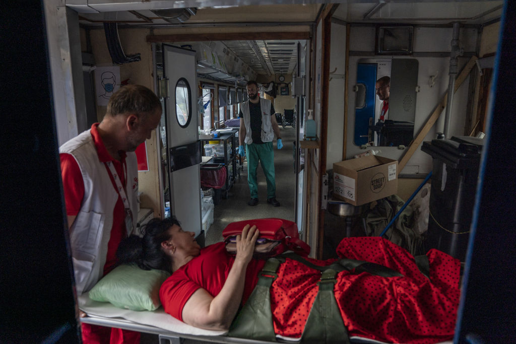 Medecins Sans Frontieres workers transfer patients in Ukraine