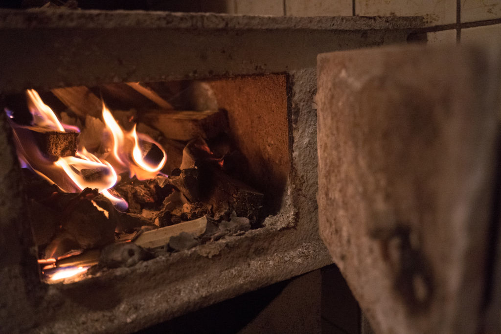 A Free-standing Wood Stove Seen In The Polish Countryside In Debe Wielkie
