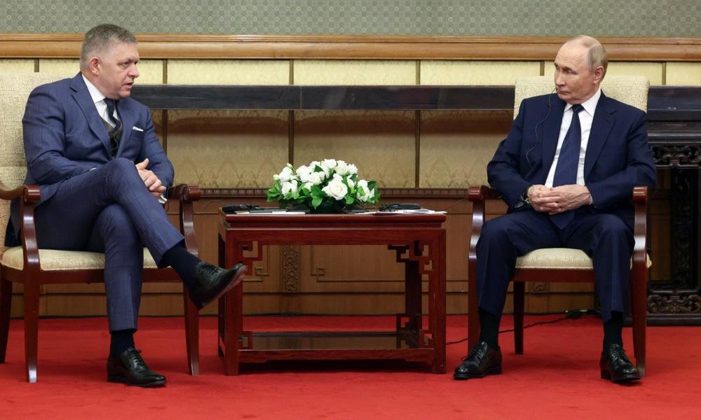 Russian President Putin meets Slovak Prime Minister Fico in China